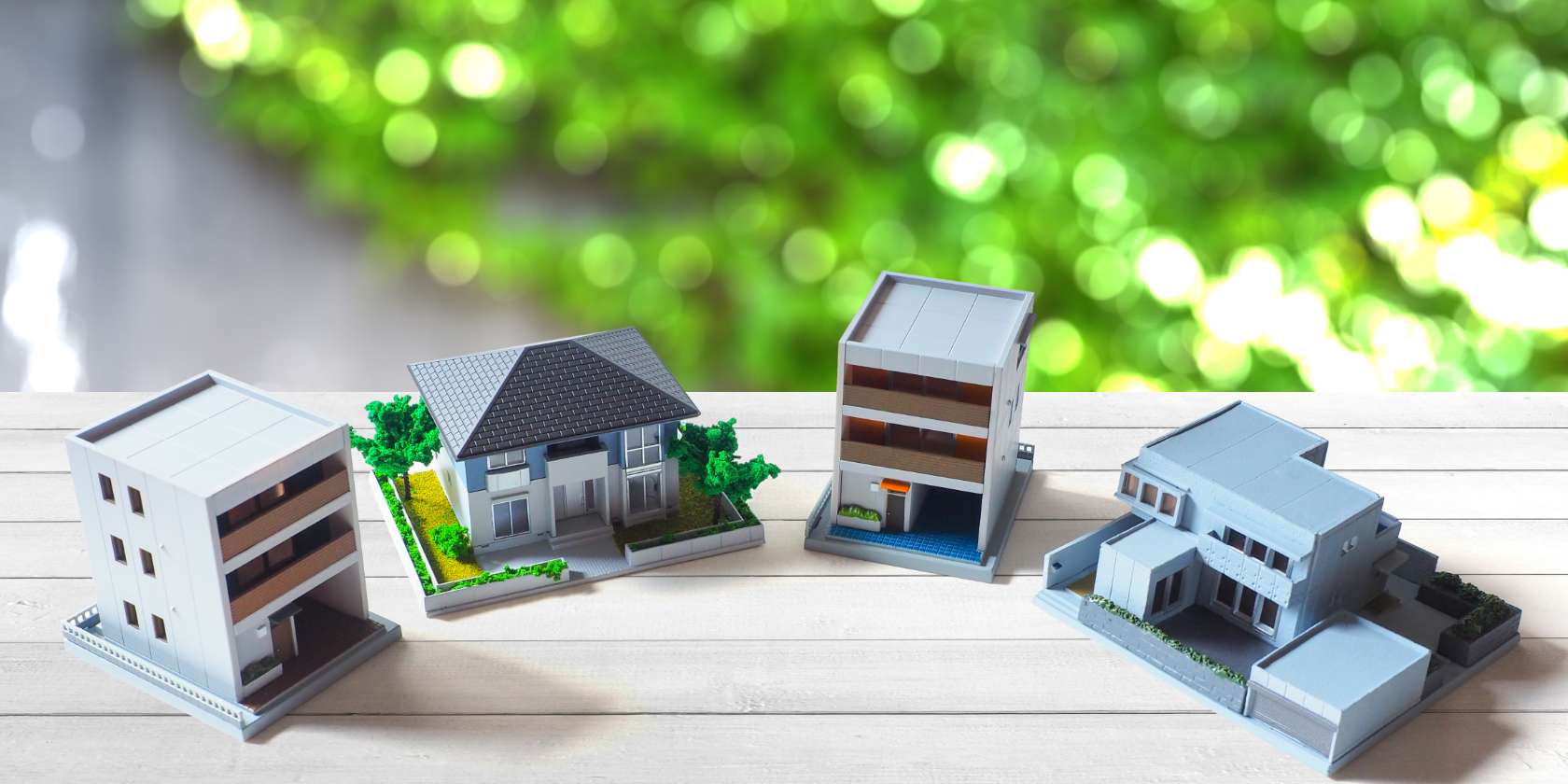 一戸建てやマンションなどのミニチュアフィギュアのイメージ写真